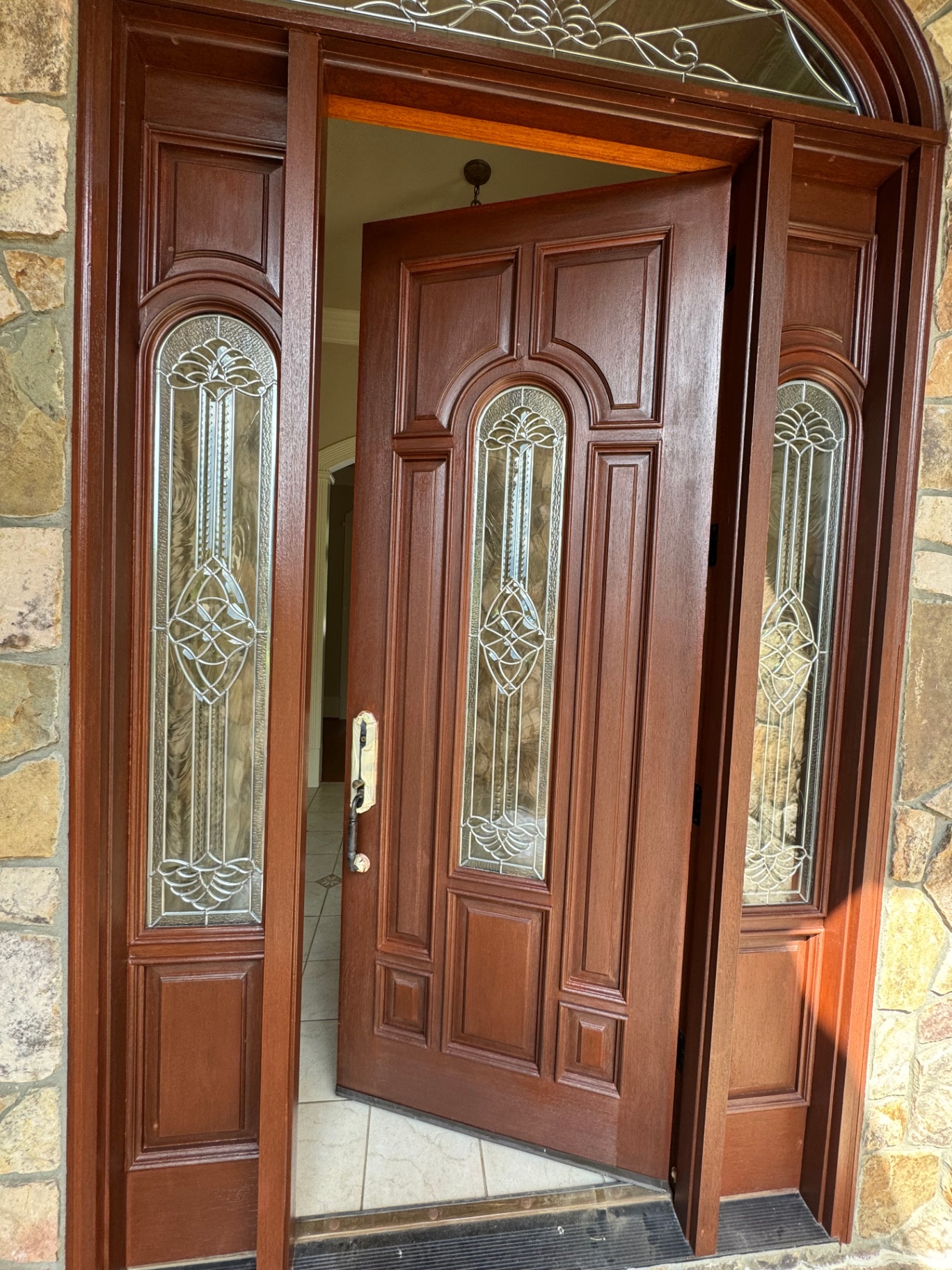 Refinished mahogany front door with stained glass